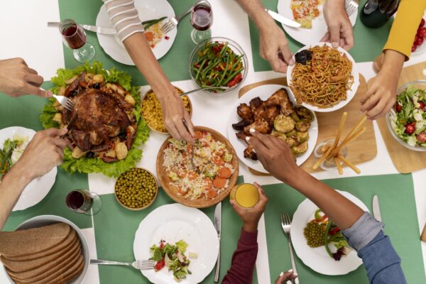 Happy family having healthier dishes for BBQ.