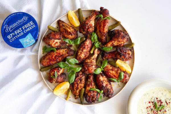 Delicious Crispy Chicken Wings coated in warming spices and paired with a creamy, high protein dip made using Brancourts 97% Fat Free Cottage Cheese.