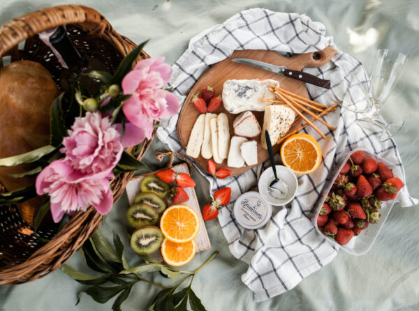 Sandwich in a chopping board highlighting the benefits of Cottage Cheese.