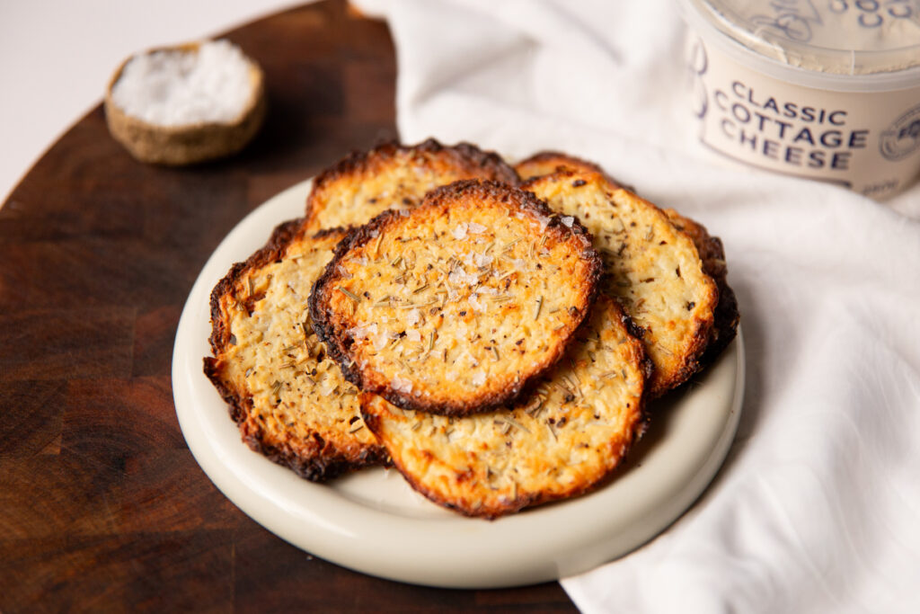 Cottage cheese chips, a simple savory snack with a crispy, crunchy texture.
